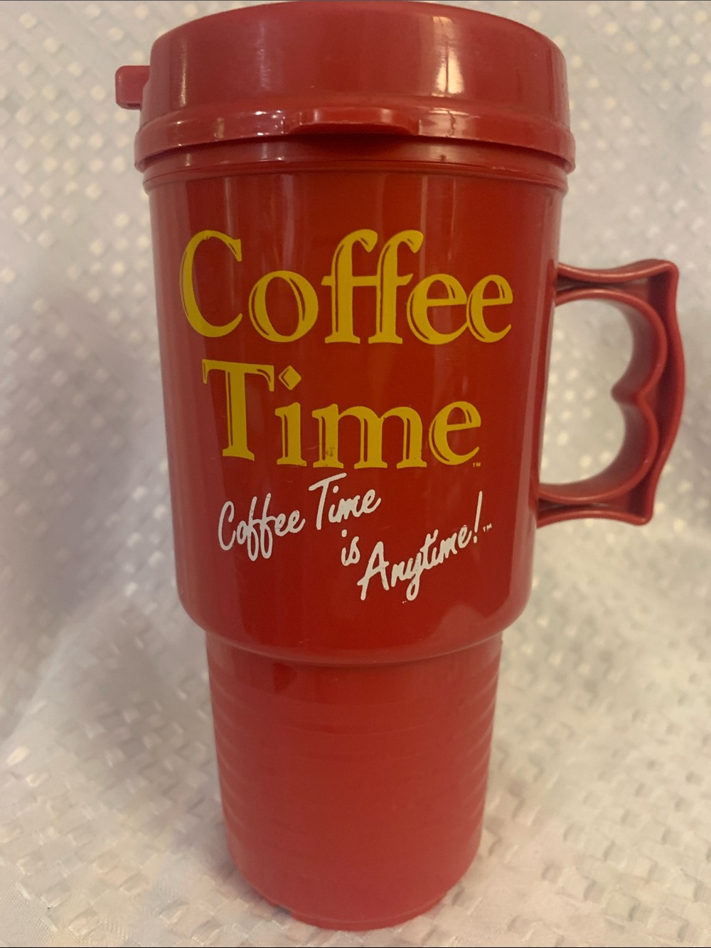 Coffee Time/Toronto Argonauts red plastic travel mug, 7 inches tall.